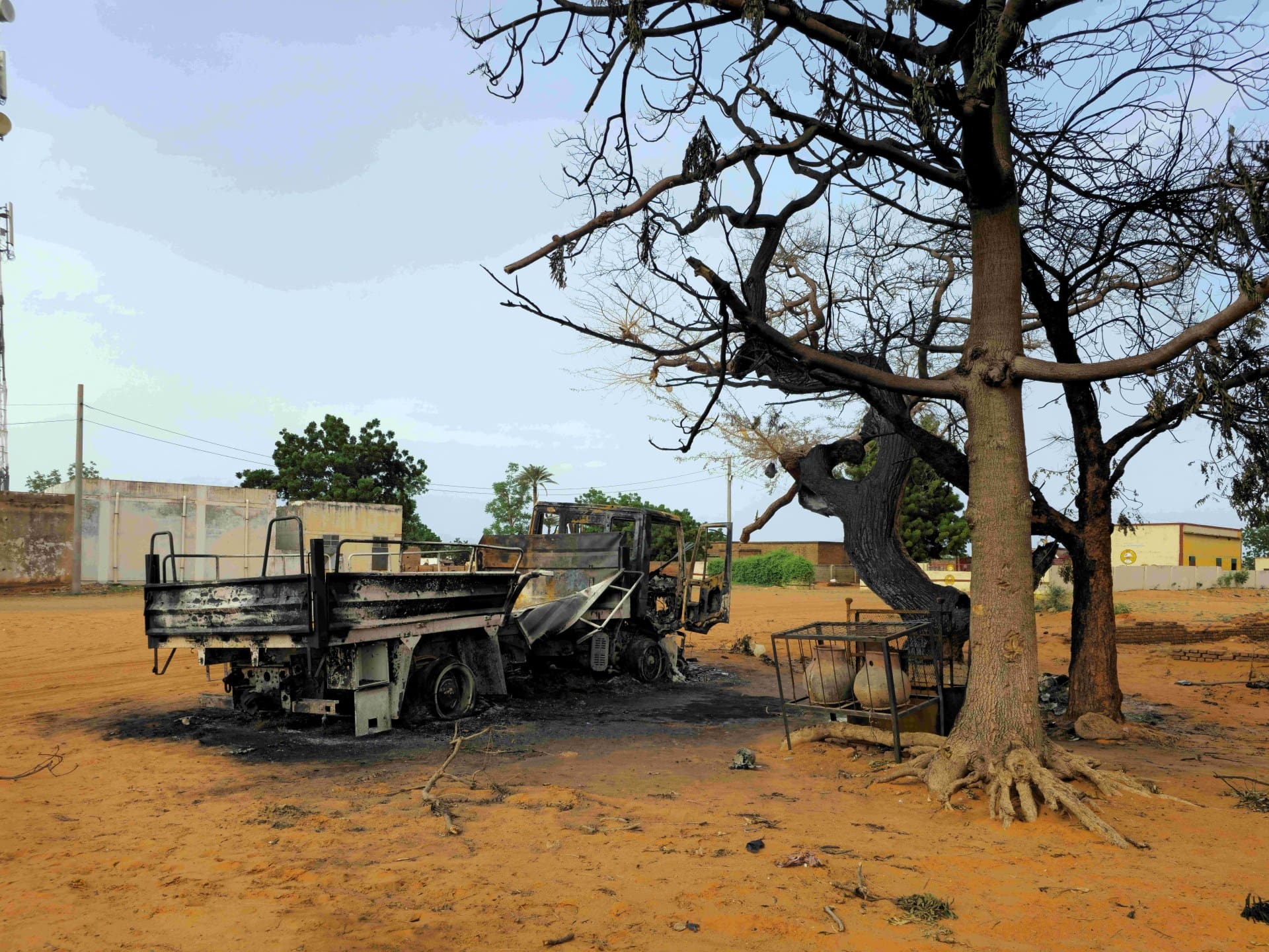 This picture shows a general view of the wreckage of a truck after the Rapid Support Forces targeted several civilian facilities earlier in the week in Al-Rahad Abu Dakna, one of the largest cities in North Kordofan State, located on the national highway linking Kosti and El Obeid, on July 25, 2026, according to government sources.