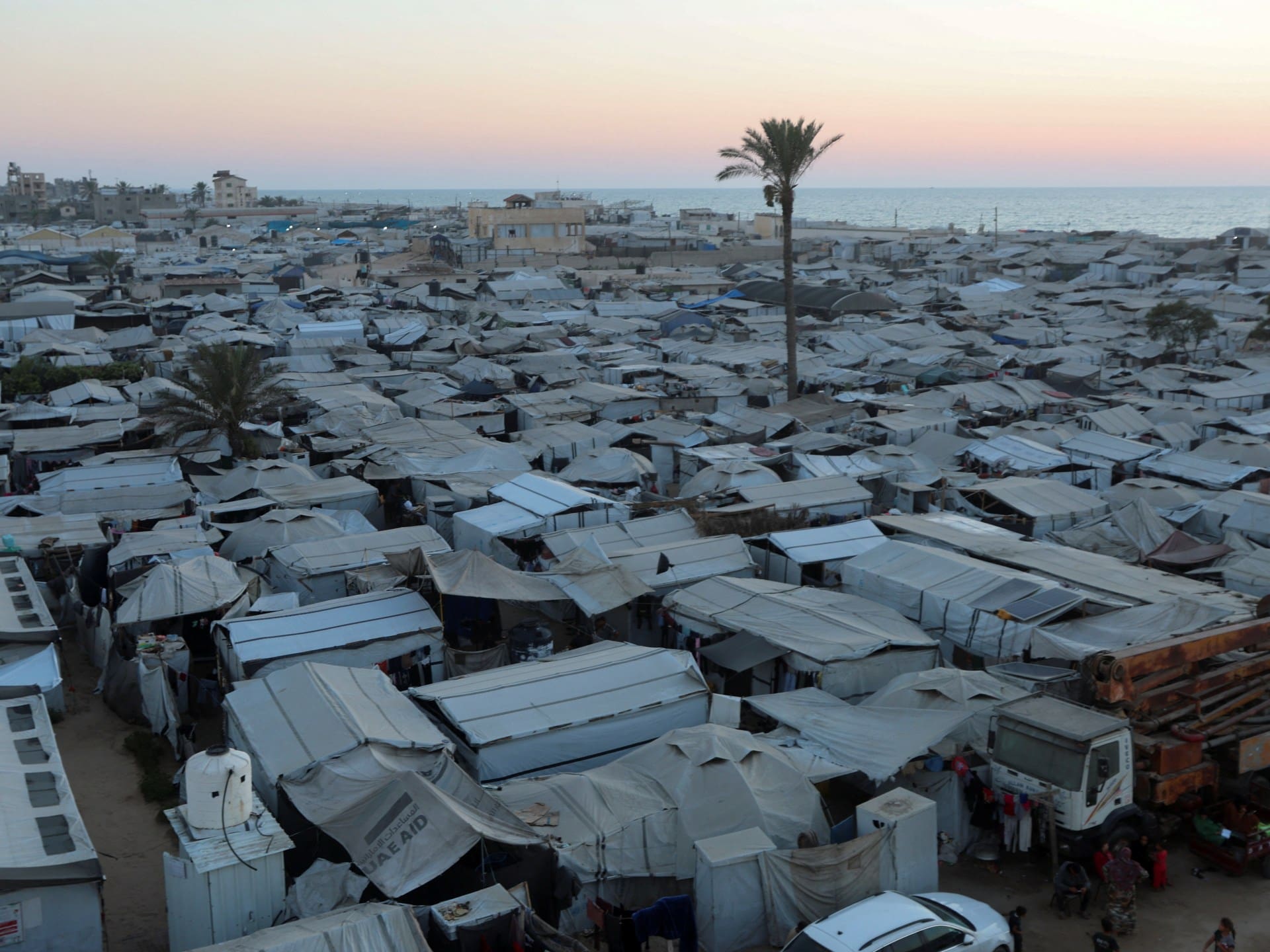 Displaced Palestinians shelter at a tent camp in Khan Younis, southern Gaza Strip, July 21, 2026. REUTERS/Ramadan Abed