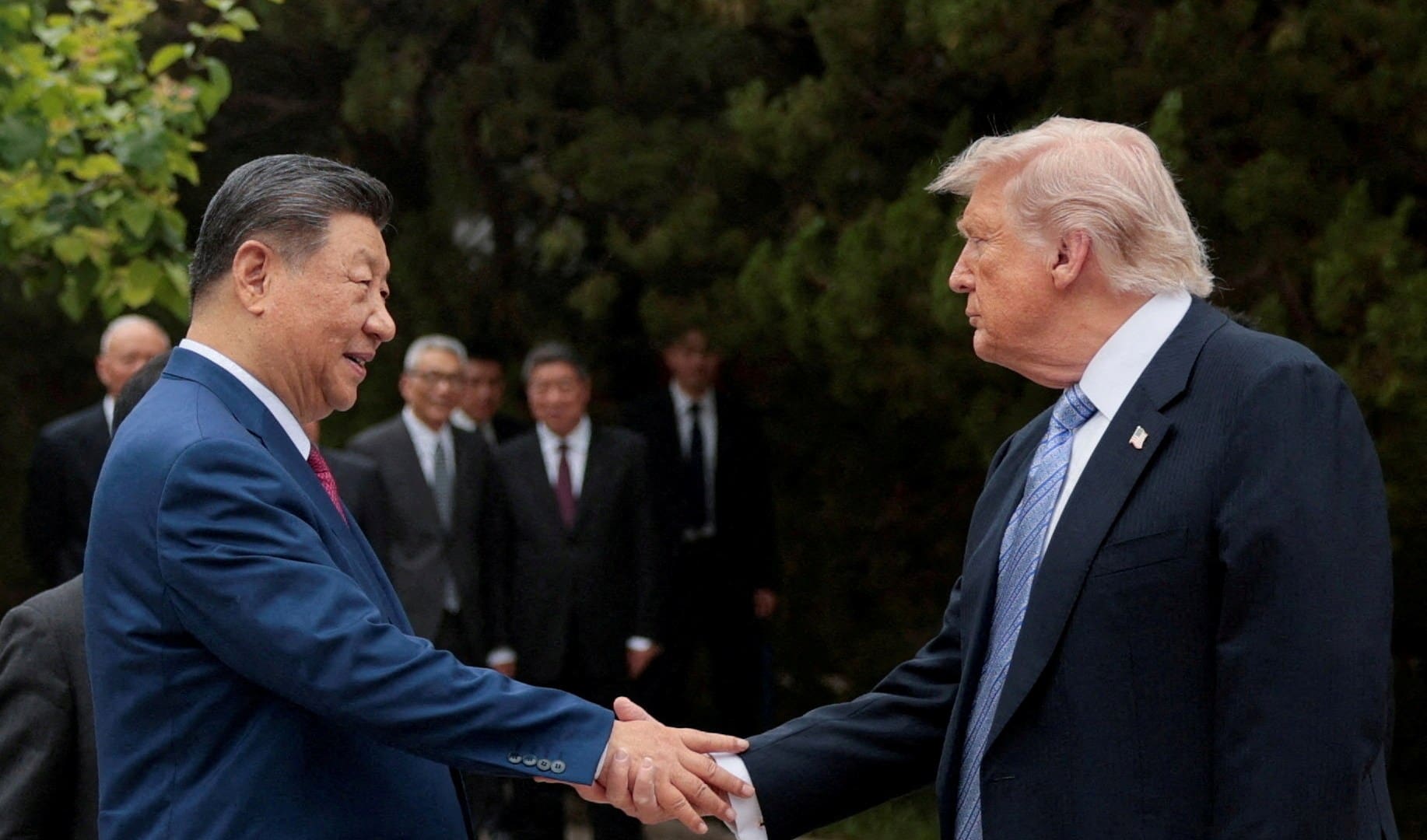 FILE PHOTO: FILE PHOTO: U.S. President Donald Trump shakes hands with Chinese President Xi Jinping while leaving after a visit to the Zhongnanhai Garden in Beijing, China, May 15, 2026. REUTERS/Evan Vucci/Pool/File Photo/File Photo