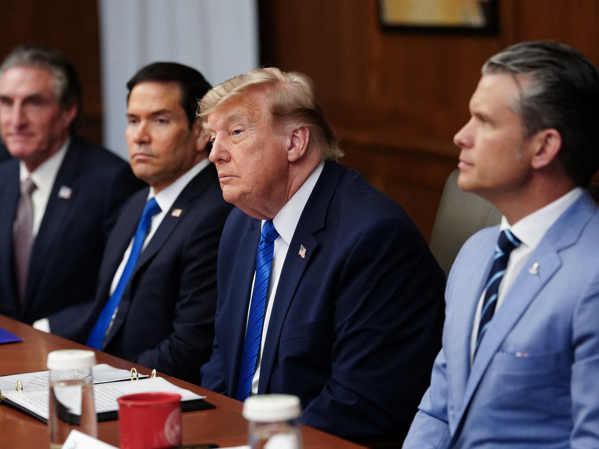 (L/R) US Secretary of the Interior Doug Burgum, Secretary of State Marco Rubio, President Donald Trump and Secretary of Defense Pete Hegseth attend a Cabinet meeting at Camp David in Maryland, on July 31, 2026. (Photo by Aaron Schwartz / AFP)